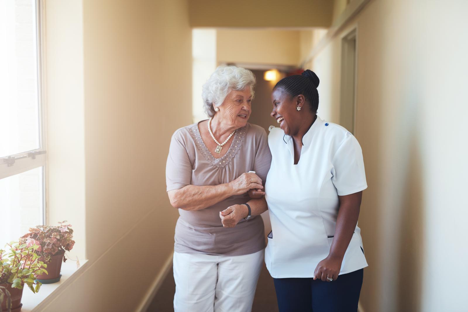 Compassionate caregiver with elderly client